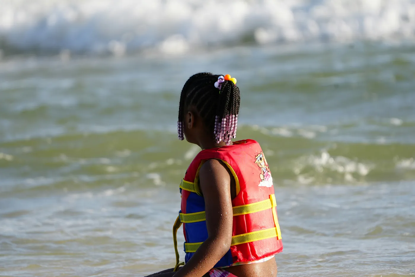 Girl with life jacket on