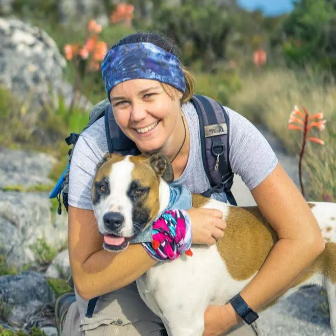 Kathy Leverton hiking with dog