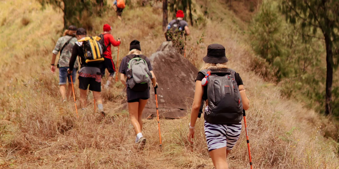 Young people hiking together in the outdoors